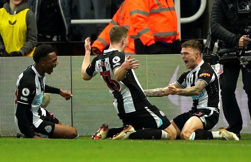 Kieran Trippier, right, celebrates after scoring Newcastle United's third goal  in their 3-1 win over Everton at St James' Park in the Premier League on Tuesday February 8, 2022. PA