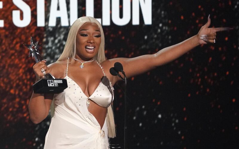 Megan Thee Stallion accepts the best female hip hop artist award at the BET Awards on Sunday, June 27, 2021, at the Microsoft Theater in Los Angeles. (AP Photo/Chris Pizzello)