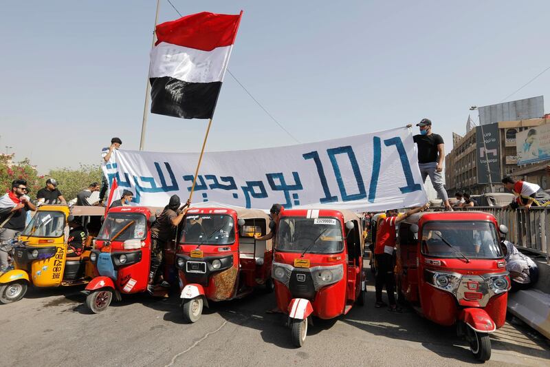 Iraqi protesters and students gather to mark the first anniversary of the anti-government protests in Baghdad, Iraq. Reuters