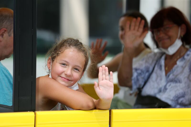 Visitors ride the Expo Explorer train. Photo: Chris Whiteoak / The National