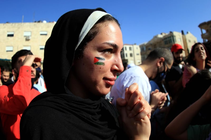 Jordanians protest in solidarity with the Palestinian people, near the Israeli embassy, in Amman. EPA