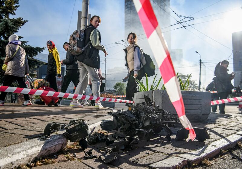 Ukrainians view parts of a drone that attacked Kyiv in October. Ukrainian authorities said it was an Iranian-made Shahed-136. Reuters