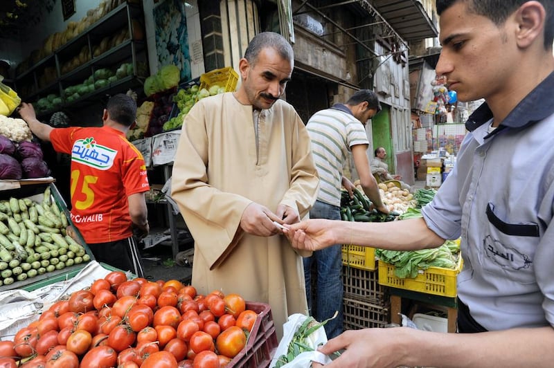 Cash still dominates the Egyptian consumer economy. It accounts for an estimated 94 per cent of financial transactions in the country. Dana Smillie for The National