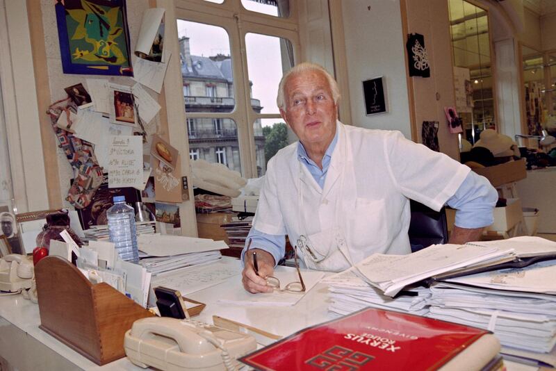 In this file photo taken on July 03, 1995 French fashion designer Hubert de Givenchy poses at the office of his fashion house in Paris. AFP