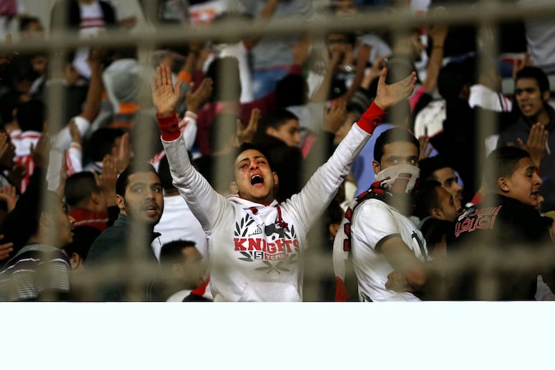 A member of Zamalek supporters club Ultras White Knights shown during an Egyptian Premier League match in February, before 20 people were killed in clashes with police outside Air Defense Stadium in Cairo where the match was being held. Ahmed Abd El-Gwad / AP Photo  El Shorouk Newspaper / February 8, 2015