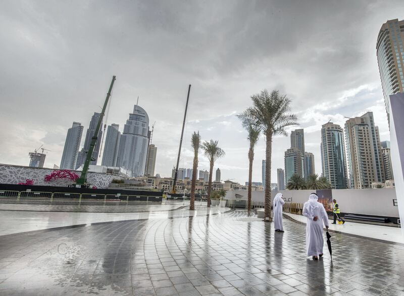 DUBAI, UNITED ARAB EMIRATES, 30 OCTOBER 2018 - Cloudy weather with drizzle of rain at Dubai Opera, Sheikh Mohammed bin Rashid Al Maktoum boulevard.  Leslie Pableo for The National