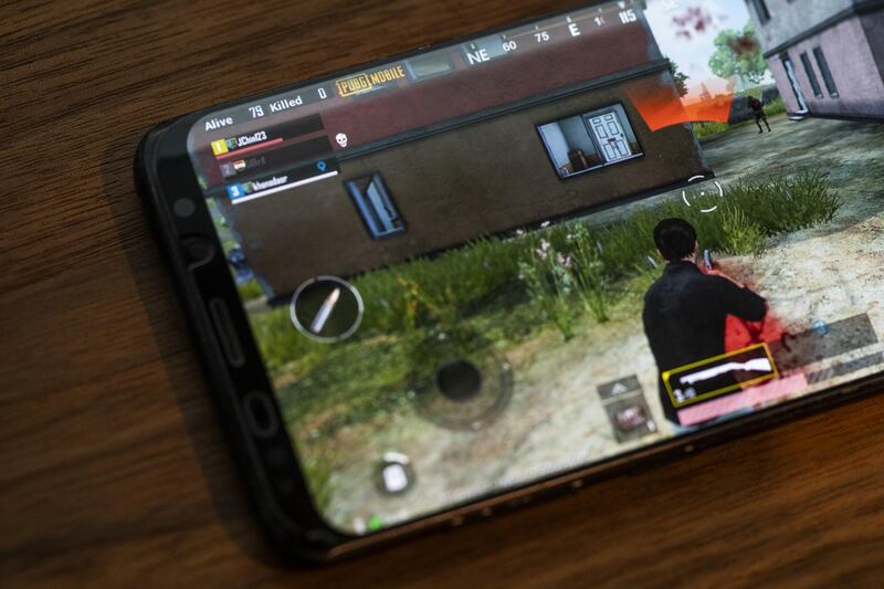 The PlayerUnknown's Battlegrounds (PUBG) game is displayed on a Samsung Electronics Co. Galaxy S9 Plus smartphone in an arranged photograph in Hong Kong, China, on Sunday, March 24, 2019. PUBG is a Hunger Games-style competition where 100 players face off with machine guns and assault rifles until only one is left standing. After China's Tencent Holdings Ltd. introduced a mobile version of the death match that's free to play, it has become the most popular smartphone game in the world, with enthusiasts from the U.S. to Russia to Malaysia. Photographer: Justin Chin/Bloomberg