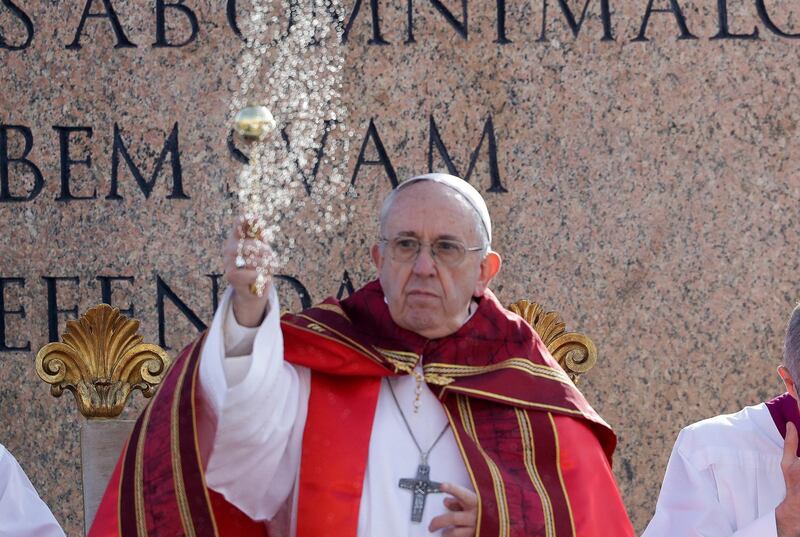 FILE - In a Sunday, March 25, 2018 file photo, Pope Francis asperses incense as he celebrates a Palm Sunday Mass in St. Peter's Square at the Vatican. A story claiming Pope Francis said his words â€œoverruleâ€ whatâ€™s in the Bible is making the rounds on websites often dealing in fake news. The article appearing on the Yournewswire site and others includes no details about when or where the pope supposedly made the remark. It says he was responding to critics who accuse him of deviating from Catholic church teachings.  (AP Photo/Andrew Medichini, File)