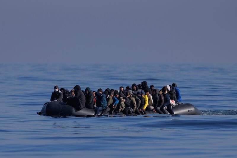 An inflatable dinghy carrying migrants crosses the English Channel in March. Getty Images