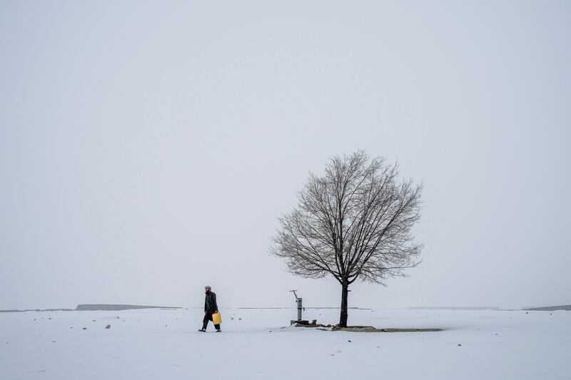 Harsh winter temperatures are forcing many in the Taliban-ruled country to choose between food and staying warm. AP