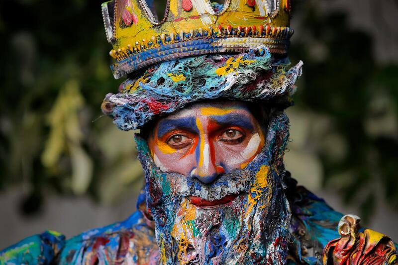 An artist of Spain's Alucinarte Animacion Teatral performs the Neptune character at the Living Statues International Festival, in Bucharest, Romania. Vadim Ghirda / AP Photo