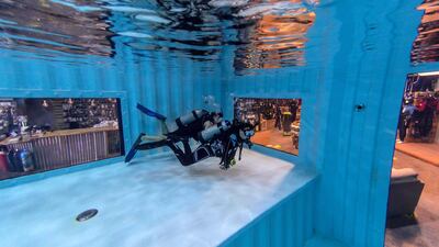 DUBAI, UNITED ARAB EMIRATES. 07 MARCH 2021.   Michela Colella, Dive Instructor, conducts a training session with a learner diver in the newly opened indoor pool at the Dive Garage facility in Al Quoz 4. The pool is constructed out of shipping containers and hols a 100 000 liters of fresh water, making it one of a kind in the Middle East. (Photo: Antonie Robertson/The National) Journalist: Janice Rodriques. Section: National.