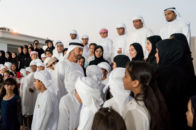 ABU DHABI, UNITED ARAB EMIRATES - October 09, 2017: HH Sheikh Mohamed bin Zayed Al Nahyan, Crown Prince of Abu Dhabi and Deputy Supreme Commander of the UAE Armed Forces (center L), speaks with martyrs' children, who have excelled in school, during a Sea Palace barza. Seen with their family members and teachers.

( Rashed Al Mansoori / Crown Prince Court - Abu Dhabi )
---