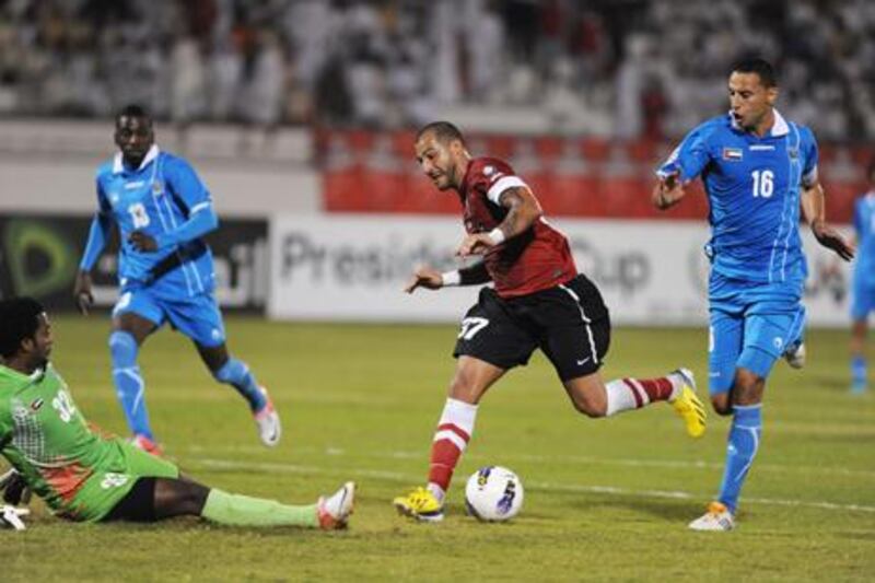 Al Ahli's Ricardo Quaresma looks to round the Dibba goalkeeper during the President's Cup quarter final.