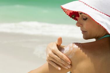 Doctors recommend reapplying SPF50 sunscreen often to protecting the skin against cancer. Getty