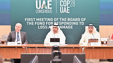 From left, Daniele Violetti, senior director for the United Nations Framework Convention on Climate Change, Dr Sultan Al Jaber, Cop28 President, and Abdulla Balalaa, the Assistant Minister of Foreign Affairs for energy and sustainability, at the loss and damage board meeting on Tuesday. Photo: Cop28