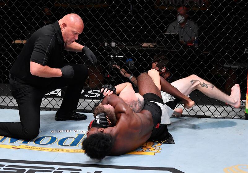 Aljamain Sterling attempts to secure a rear choke submission against Cory Sandhagen at UFC 250. Reuters