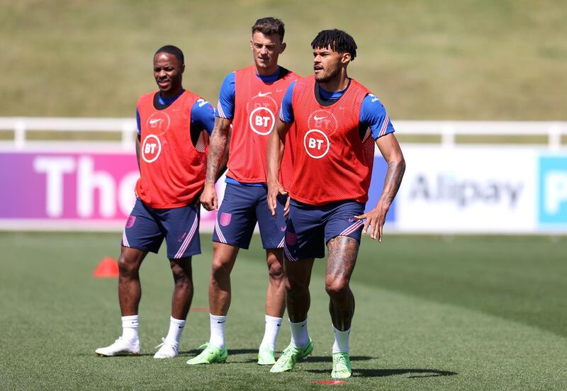 Left to right: Raheem Sterling, Ben White and Tyrone Mings. Getty
