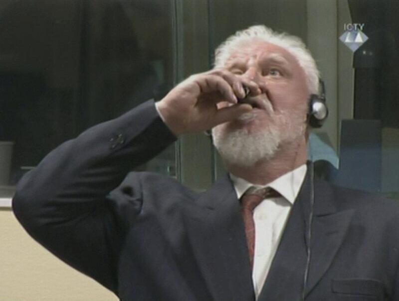 REFILE - CORRECTING TYPO A wartime commander of Bosnian Croat forces, Slobodan Praljak, is seen during a hearing at the U.N. war crimes tribunal in the Hague, Netherlands, November 29, 2017. ICTY via REUTERS TV ATTENTION EDITORS - THIS IMAGE WAS PROVIDED BY A THIRD PARTY.