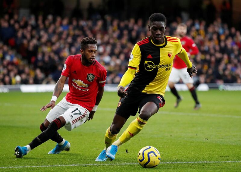 Watford's Ismaila Sarr in action with Manchester United's Fred. Reuters