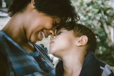 Demonstrations of affection are vital to positive parenting. Unsplash / Bruno Nascimento