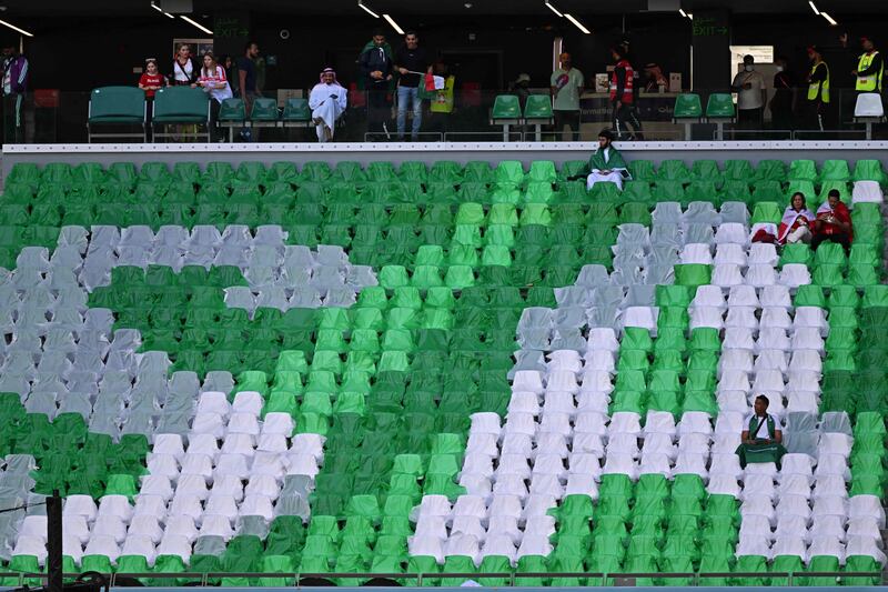 Football fans wait for the start of the Group C World Cup match between Poland and Saudi Arabia at the Education City Stadium on November 26. AFP
