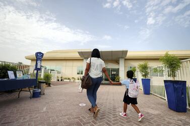 A pupil arrives for classes at Horizon International School in Dubai. Chris Whiteoak / The National