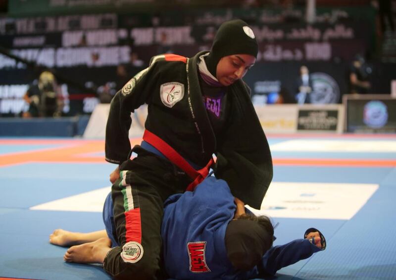 Alyazyah Al Shehyari (in black) of the UAE shown in her match with May Sherif Mahmoud of the UAE in the Abu Dhabi World Youth Jiu-Jitsu Championship 2016. Ravindranath / The National