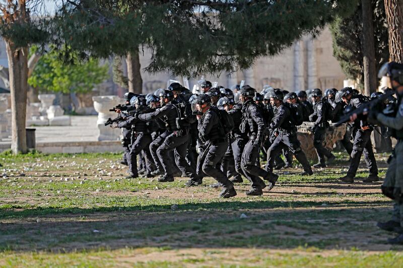 Israeli security forces advance against worshippers and protesters Jerusalem's Al Aqsa Mosque compound. Witnesses said that Palestinian protesters threw stones at Israeli security forces, who fired rubber bullets at some of the demonstrators. AFP