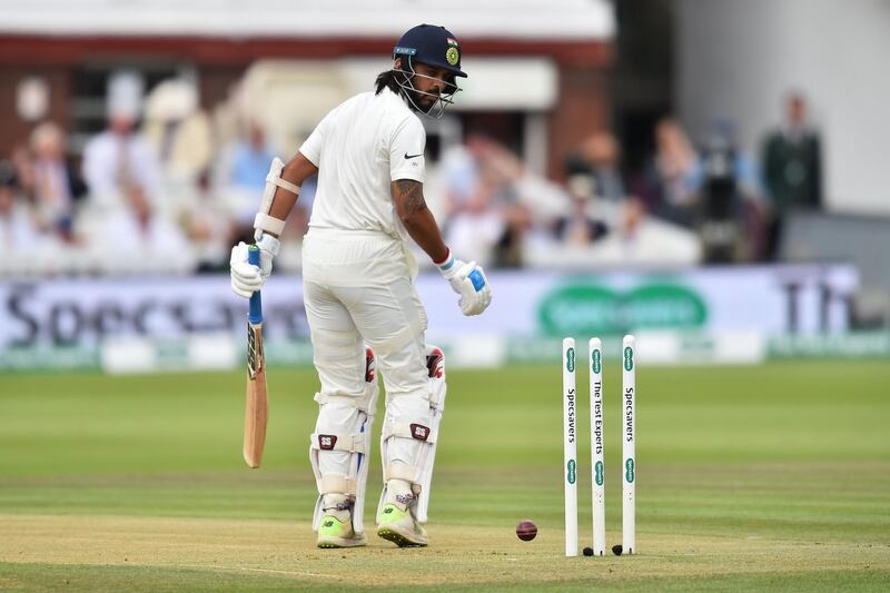 India's Murali Vijay looks back at the stumps after being bowled out by England's James Anderson for 0 runs on the second day of the second Test cricket match between England and India at Lord's Cricket Ground in London on August 10, 2018. (Photo by Glyn KIRK / AFP) / RESTRICTED TO EDITORIAL USE. NO ASSOCIATION WITH DIRECT COMPETITOR OF SPONSOR, PARTNER, OR SUPPLIER OF THE ECB