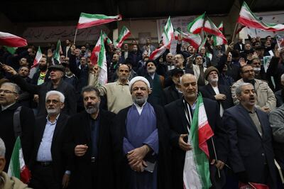 Hamid Rasaee, centre, a cleric and former member of the Islamic Consultative Assembly, at a campaign rally in Tehran. AFP