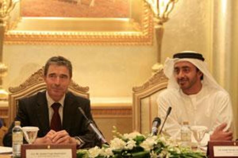 Sheikh Abdullah bin Zayed, the UAE Minister of Foreign Affairs, right, and Anders Fogh Rasmussen, Nato's secretary general, at the Nato-UAE Relations Cooperation Initiative in Abu Dhabi.