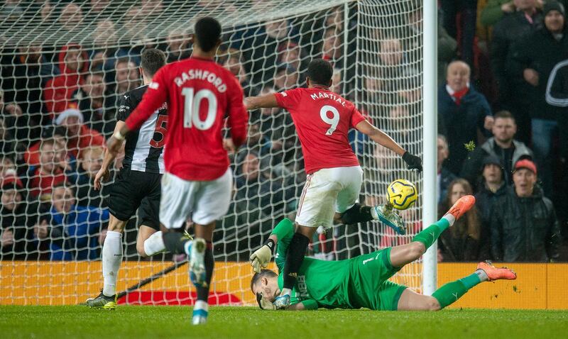Manchester United's Anthony Martial, right, scores his team's fourth goal at Old Trafford. EPA
