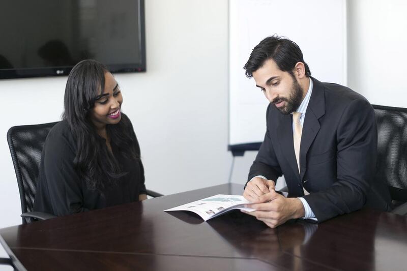 Paris Norriss, right, director, Coba Education, meets with Naima Ismail, recruitment consultant. Reem Mohammed / The National