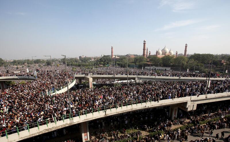 People gather to attend funeral services for Khadim Hussain Rizvi, leader of religious and political party Tehreek-e-Labaik Pakistan in Lahore.  Reuters