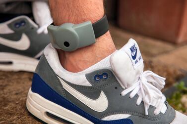 Electronic tags are widely used in countries such as the UK, where they are traditionally fitted on the ankle. Alamy