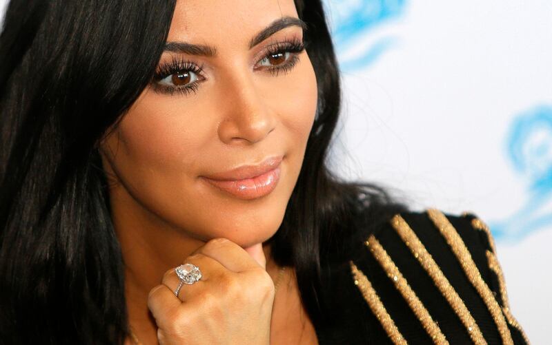 FILE - In this June 24, 2015 file photo, American TV personality Kim Kardashian attends the Cannes Lions 2015, International Advertising Festival in Cannes, southern France. A new suspect is facing potential charges in the investigation into a 2016 jewelry heist in Paris targeting Kim Kardashian West. A judicial official said Friday April 13, 2018 the suspect was detained Tuesday, and is meeting Friday with an investigative judge who is expected to file preliminary charges. (AP Photo/Lionel Cironneau, File)