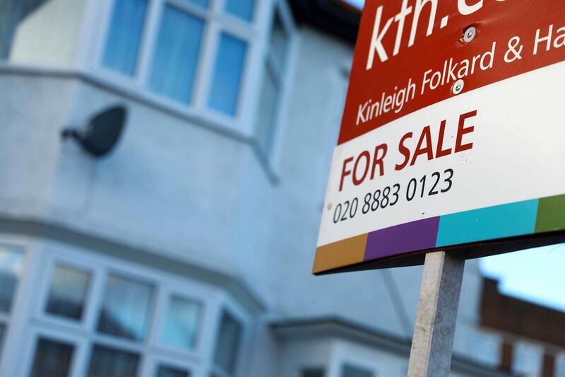 epa06418344 A sign advertising a house sale is displayed outside a residential property in London, Britain, 05 January 2018. London property prices went into decline in 2017 for the first time since 2009. The average price of a home in London fell 0.5 per cent in 2017 to £470,922  EPA/NEIL HALL