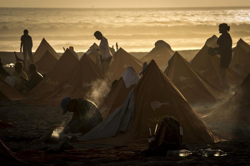 Competitors take part in the fourth stage during the first edition of the Marathon des Sables Peru between Ocucaje and Arloveto  in the Ica desert. Jean-Philippe / AFP Photo