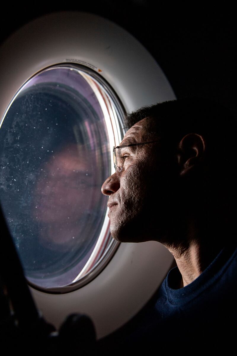 Mr Rubio peers out of a window aboard the SpaceX Dragon Freedom spacecraft docked to the ISS. AP