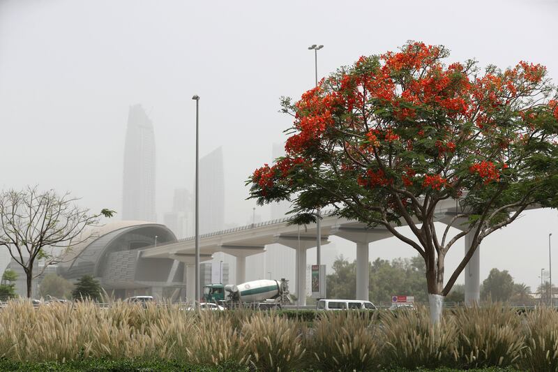 A dusty, hazy day at Dubai Creek. The UAE has been in the grip of sand and dust storms since Tuesday. Chris Whiteoak / The National