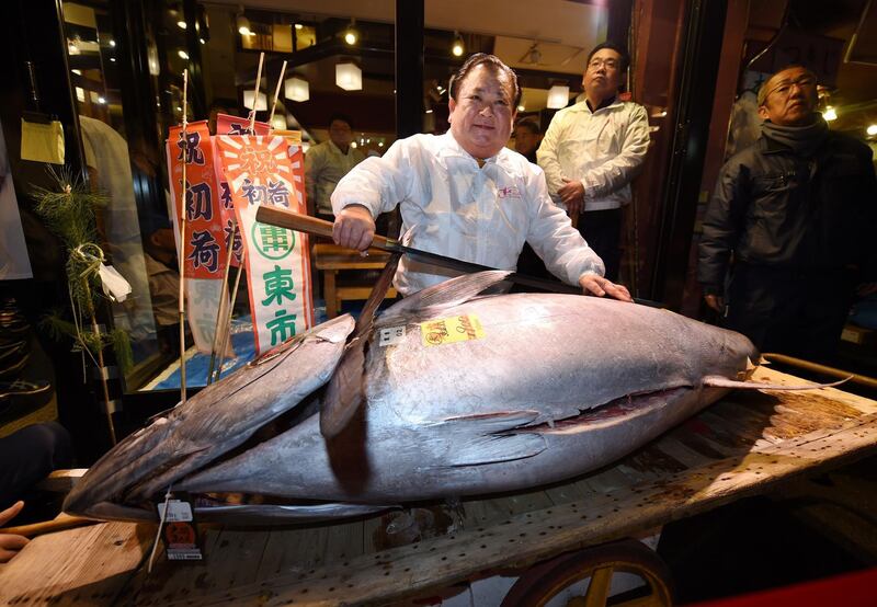 Kiyoshi Kimura, president of sushi restaurant chain Sushi-Zanmai, displays a 190-kilogram bluefin tuna near Tokyo's Tsukiji fish market. Kazuhiro Nogi / AFP Photo