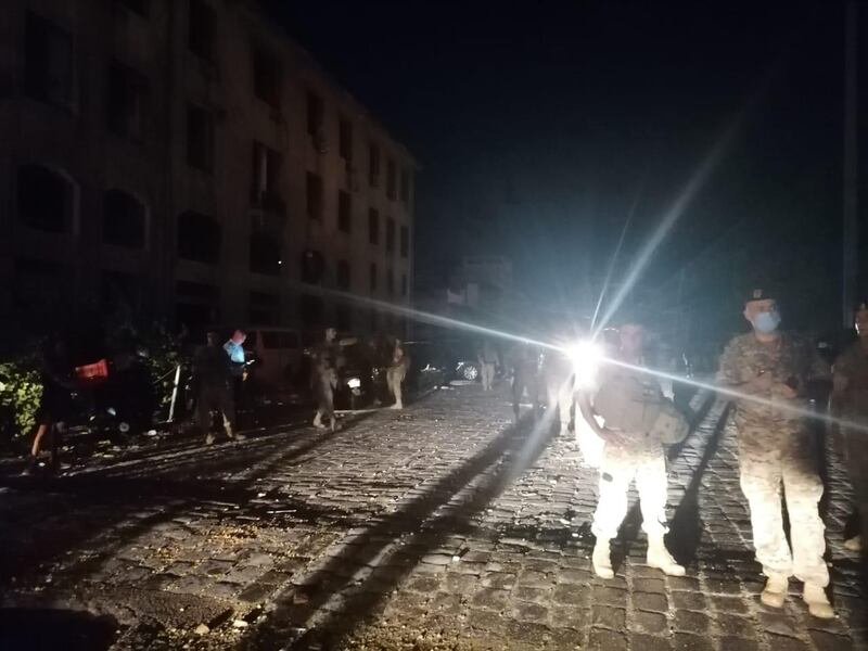 Army personnel around entrance to port.