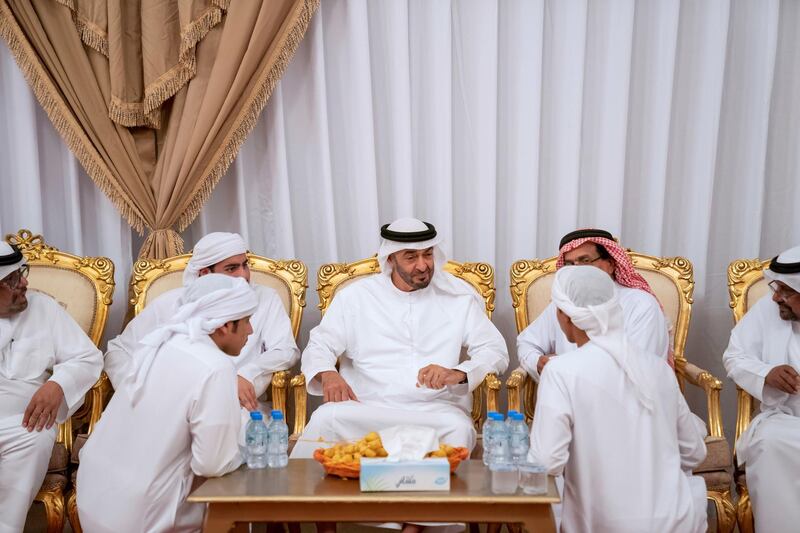 BANIYAS, ABU DHABI, UNITED ARAB EMIRATES - September 15, 2019: HH Sheikh Mohamed bin Zayed Al Nahyan, Crown Prince of Abu Dhabi and Deputy Supreme Commander of the UAE Armed Forces (C), offers condolences to the family of martyr Warrant Officer Saleh Hassan Saleh bin Amro.

( Mohamed Al Hammadi / Ministry of Presidential Affairs )
---
