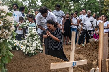 Mourners at the funeral of a victim of the Easter Sunday attacks. Getty