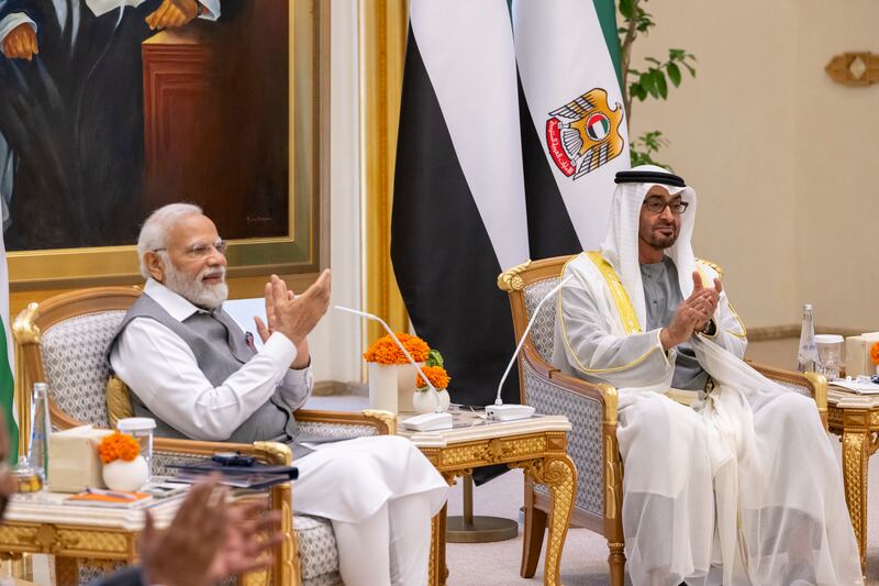 President Sheikh Mohamed and Narendra Modi, Prime Minister of India, witness an agreement between the UAE and India during an official reception at Qasr Al Watan. Mohamed Al Hammadi / UAE Presidential Court