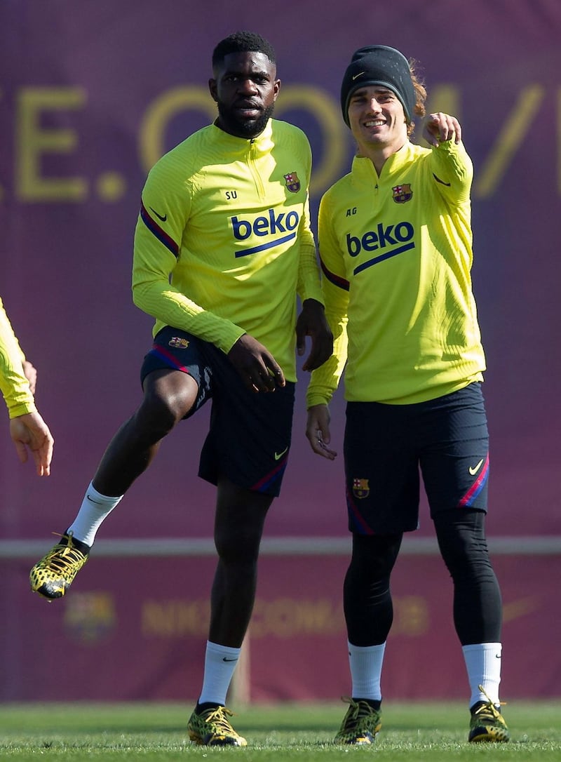 Barcelona's Samuel Umtiti, left, and Antoine Griezmann during training. EPA