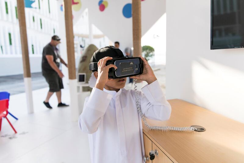 ABU DHABI, UNITED ARAB EMIRATES - MARCH 22, 2018. 

A child at the VR Hobara conversation booth at The Mother of the Nation Festival.

Organised by the Department of Culture and Tourism, the festival is a celebration of the life of Sheikha Fatima bint Mubarak, wife of UAE Founding Father Sheikh Zayed, chairwoman of the General Women's Union, president of the Supreme Council for Motherhood and Childhood, and Supreme Chairwoman of the Family Development Foundation

(Photo: Reem Mohammed/ The National)

Reporter: 
Section:  NA 