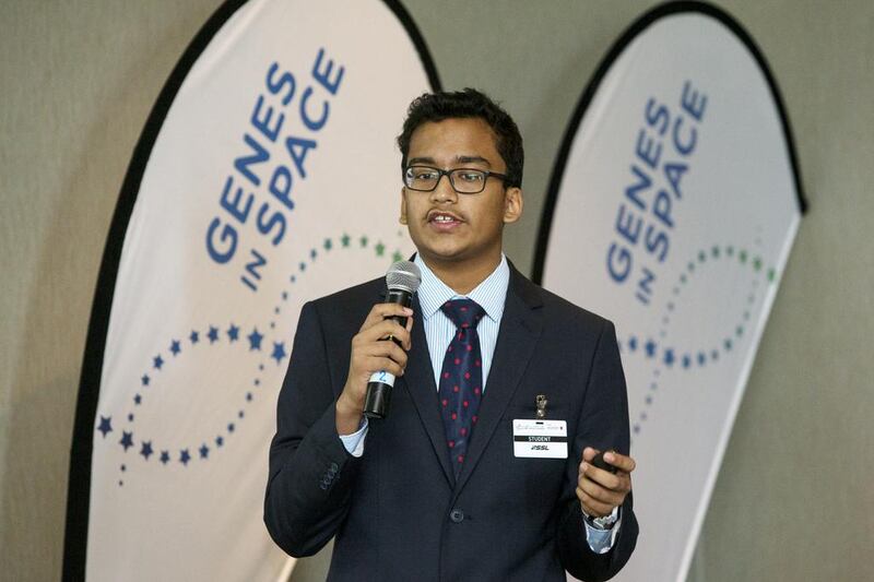 Finalist Karun Isaac, 14, from the Gems Modern Academy in Dubai, presents his project at the Global Space Congress in Abu Dhabi. Christopher Pike / The National