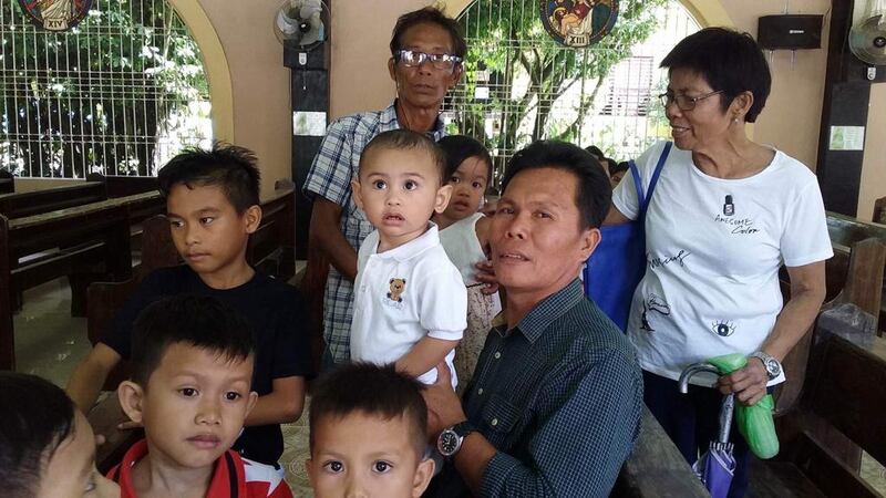 Eve Quirante's parents, far right, are looking after her children in the Philippines. Courtesy: Eve Quirante 